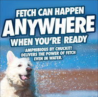 A fluffy white dog plays in beach water under a clear sky. Bold text above says, Fetch Can Happen Anywhere When Youre Ready, promoting Chuckits Amphibious Roller for aquatic-loving dogs.