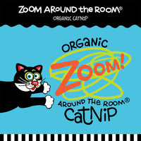 A playful black and white cat with a long tail, wide eyes, and a smiling face enjoying airborne fun adorns the design. The text reads FAT CAT Classic Appeteasers Cat Toy by Fatcat, surrounded by colorful designs and a border of black and white stripes.