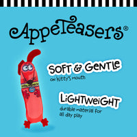 The FAT CAT Classic Appeteasers Cat Toy packaging showcases a red fish cartoon toy with Zoom Around the Room organic catnip. It has text on a blue background stating Soft & Gentle on kittys mouth and Lightweight, durable material for airborne fun, underlined by a black and white striped top edge.