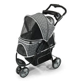 The Gen7Pets Black Onyx Promenade Pet Stroller by Gen7 features an all-terrain wheel, a circular pattern with white trim, four wheels, a front footrest, mesh canopy for ventilation, cup holders on the handle, and a storage basket underneath.