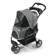 The Gen7Pets Black Onyx Promenade Pet Stroller by Gen7 features an all-terrain wheel, a circular pattern with white trim, four wheels, a front footrest, mesh canopy for ventilation, cup holders on the handle, and a storage basket underneath.