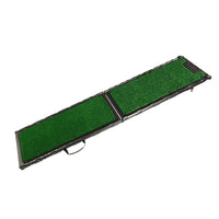 The Gen7Pets Natural Step Ramp for Vehicles by Gen7 features a foldable design for dogs, with a lush poly-grass surface, elegant black frame, and convenient side handle for easy portability.