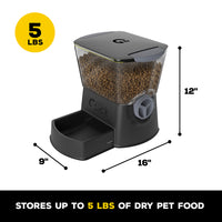 The Gamma2 Nano Click Manual Pet Feeder includes a transparent container with secure sealing, stores up to 5 pounds of dry food, and measures 16 x 9 x 12. It features a black base with a feeding bowl.