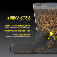 The image shows a Nano Click Manual Pet Feeder by Gamma2 filled with dry food. Features include Fresh Portions with Every Click for precision, Gamma Seal Technology, Measured Portion Control, and a Simplified Design.