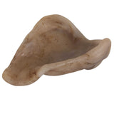 A close-up of the BarkBone Natural Instincts Nylon Pig Ear reveals its smooth, curved, shell-like beige surface with a marbled texture and subtle brown streaks, giving it an organic appearance ideal for curious explorers.