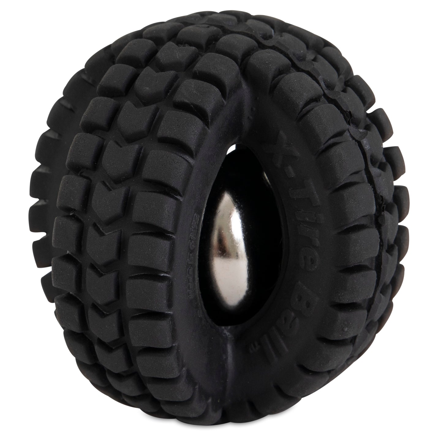 Close-up of the Pet Qwerks Jingle X-Tire Ball, a black rubber dog toy by Petqwerks, resembling a thick tire with rugged tread. A metallic jingle ball is embedded and visible through the open space, set against a plain white background.