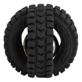 The Petqwerks Jingle X-Tire Ball dog toy has a black rubber tire-like design with grooves and treads. It features two connected tires with a visible silver jingle ball in between for extra fun.