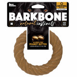 The packaging for BarkBone Natural Instinct Peanut Butter Infused Nylon Chew Ring features allergen-free peanut butter flavor for tough chewers, a dogs face in the background, and is made in the USA. Available in medium size from Barkbone Natural Instincts.