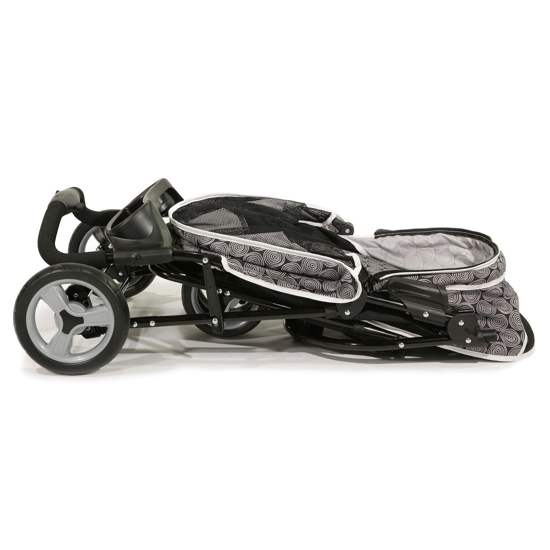 A folded Gen7Pets Black Onyx Promenade Pet Stroller lies on its side, featuring circular pattern accents, large rear all-terrain wheels, a smaller front wheel, and an exposed handlebar and seating area with a smart-comfort pad.