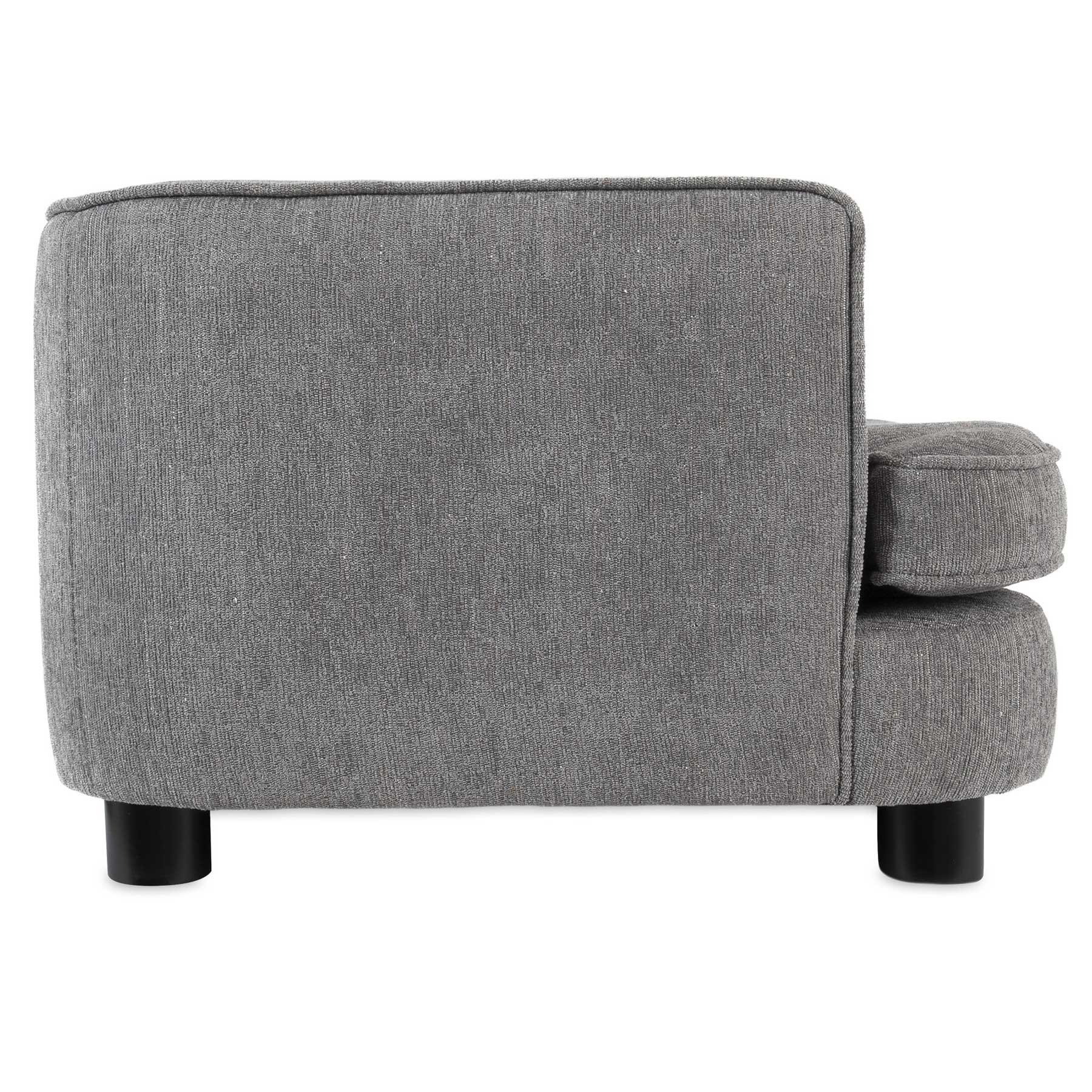 A side view of a gray upholstered armchair with minimalist design, crafted from quality materials. It features soft cushioning, a straight backrest, and two cylindrical black legs. The fabrics texture resembles fine furnishings like the La-Z-Boy Bartlett Sofa Dog Bed by La-Z-Boy.
