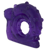 Introducing the JW Snail Teether Puppy Toy by Jw, a purple textured chew toy perfect for teething puppies. Its ring shape features a circular hole and small raised bumps, offering excellent grip and stimulating entertainment for your furry friend.