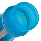 A close-up of the open Petmate Blue Replendish To-Go Travel Water Bottle, featuring a wide mouth and translucent hue. The bottle has a textured grip and sleek design, perfect for pet travel hydration, and comes with a removable water bowl.