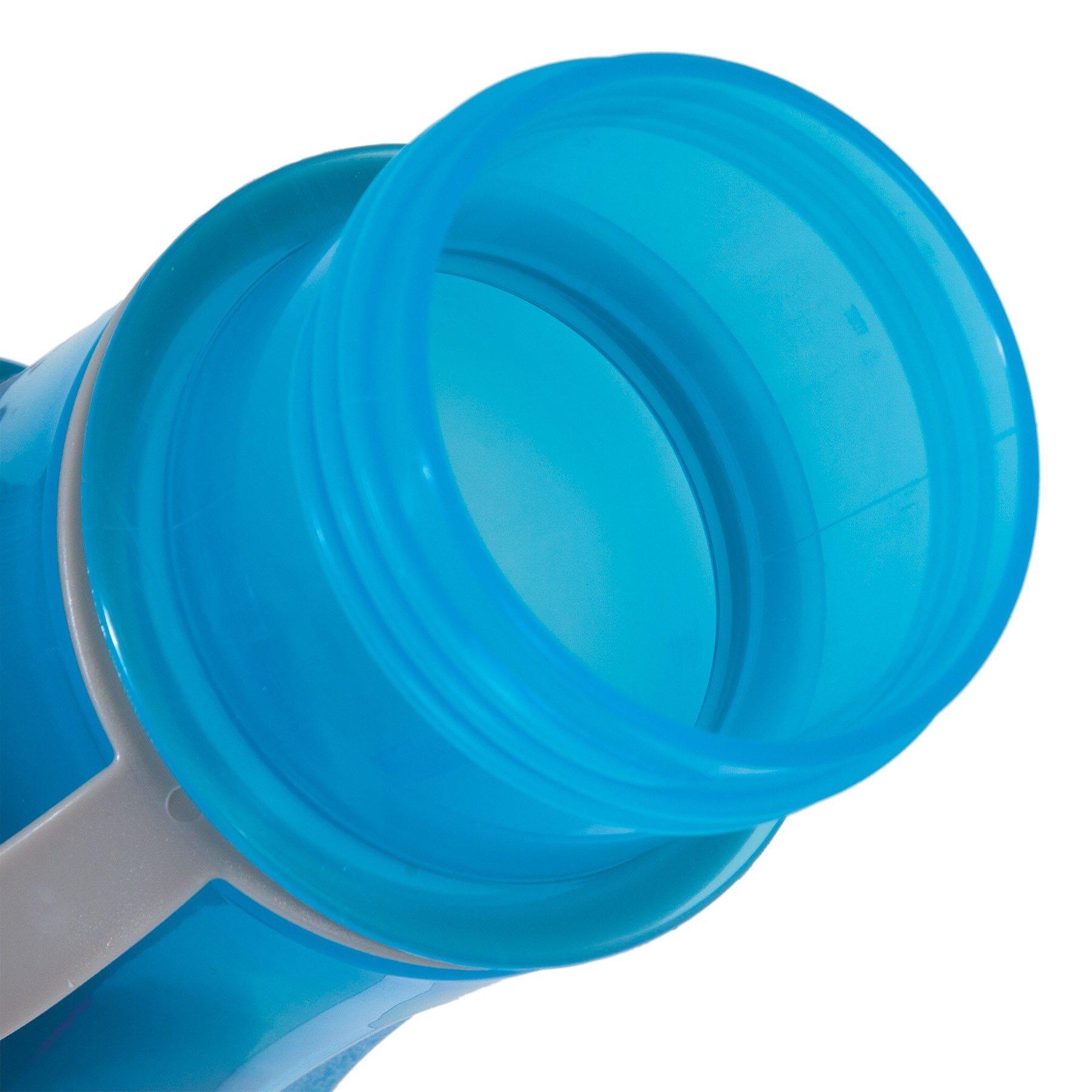 A close-up of the open Petmate Blue Replendish To-Go Travel Water Bottle, featuring a wide mouth and translucent hue. The bottle has a textured grip and sleek design, perfect for pet travel hydration, and comes with a removable water bowl.