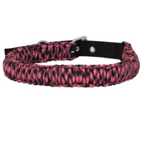 The Aspen Pet Paracord Dog Collar features a hand-braided pink and black woven design, equipped with a side-release buckle and a sturdy metal D-ring for leash attachment.
