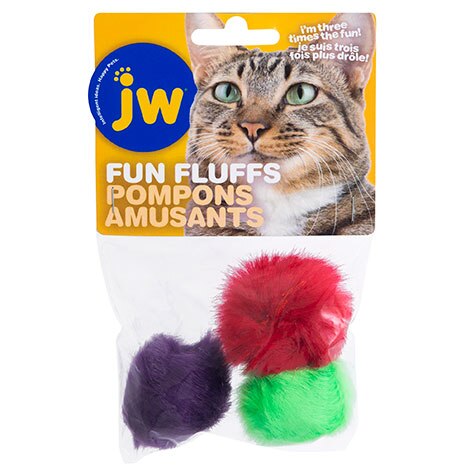 The JW Fun Fluffs Cat Toy packaging features a cat photo with three colorful polyester balls in red, green, and purple, accompanied by the text Im three times the fun! and Pompons Amusants, highlighting these catnip-infused toys as irresistible for feline fun.