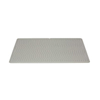 The PetFusion ToughGrip Cat Litter Mat features premium silicone in a rectangular shape with a wavy line pattern, ensuring excellent odor prevention.