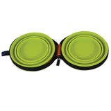 The Petmate Silicone Travel Bowl Duo by Petmate includes two green collapsible silicone bowls in an open black zippered case, ideal for travel. The nested bowls fit into grooves, while a small blue fabric loop accents the case.