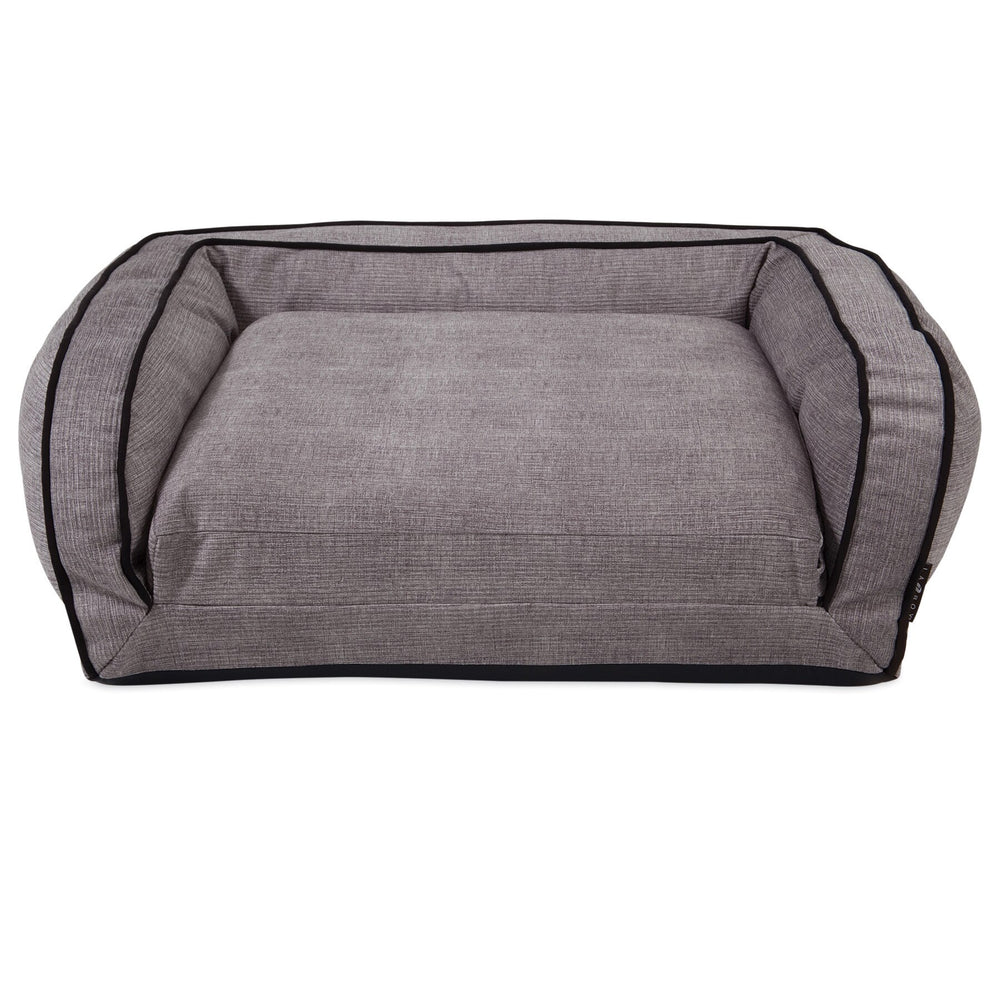 The La-Z-Boy Duchess Fold Out Sleeper Sofa Dog Bed features a rectangular design with raised edges, a ComfortCore® GEL cushion center, iClean fabric for subtle texture, and black piping.