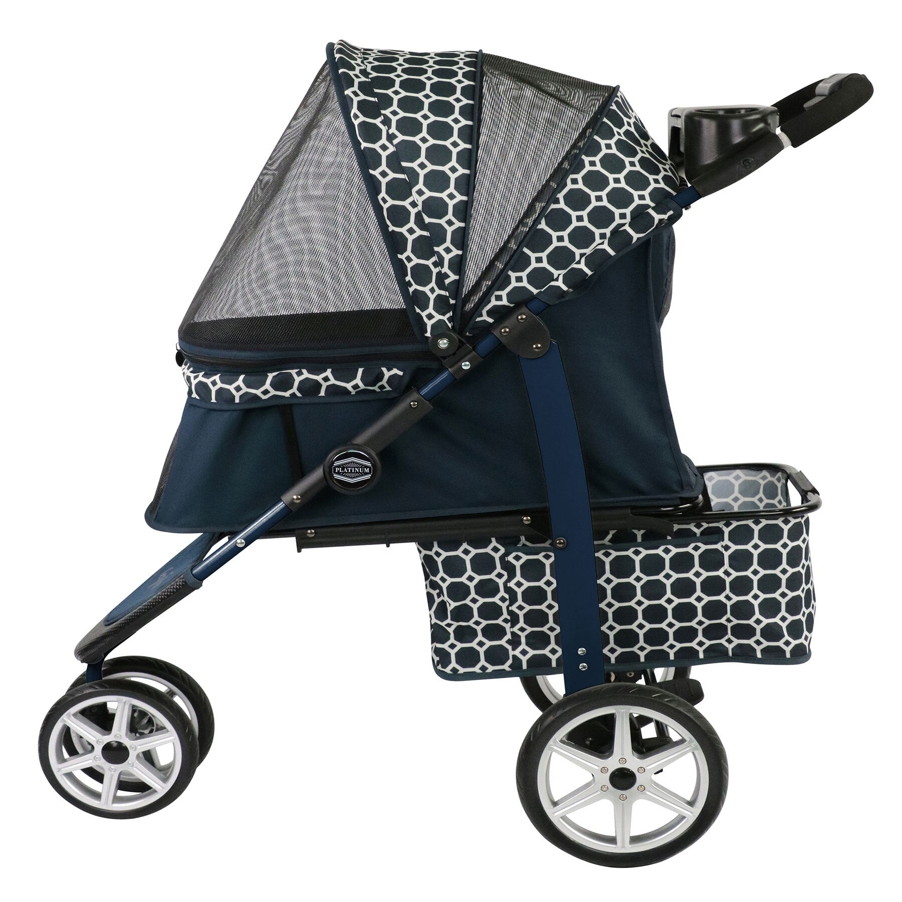 The Gen7Pets Monaco Dress Blue Pet Stroller by Gen7 showcases a geometric pattern of white hexagons. It includes a Smart-Zipper Canopy, shock-absorbing Smart-Wheels, a cup holder, and an undercarriage storage basket for added convenience.