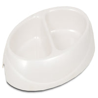 The Petmate Ultra Lightweight Double Diner from Petmate features an oval design with two compartments in white and is enhanced with Microban technology to maintain cleanliness.