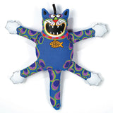 The FAT CAT Terrible Nasty Scaries Dog Toy by Fatcat is a colorful plush toy cat with a cartoonish expression, multiple legs, and vibrant blue, purple, and green patterns. Made of durable canvas, it includes a squeaker and reads Dirty Rotten Kitty.