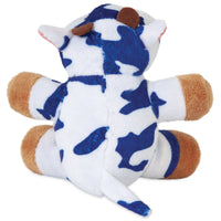 A delightful Zoobilee Softies Dog Toy sits with its back to the viewer, displaying blue and white patches, small brown horns, brown hooves, and a short tail. Its irresistibly fuzzy plush texture exudes charm.