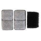 Two gray rectangular debris filters with stitched edges sit beside a single black porous charcoal filter, showcasing the varied Petmate Fresh Flow II filtration materials.