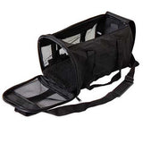 The Petmate Soft Sided Kennel Cab, a black mesh carrier lying on its side, is perfect for airline travel with a zippered flap, shoulder strap, top handle, and cushioned interior for small animals.