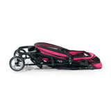 The Gen7Pets Raspberry Sorbet Regal Plus Pet Stroller by Gen7, in pink and black, has a visible wheels and frame design. It cleverly folds flat for easy storage and transport and includes the innovative Smart-Canopy for added convenience.